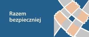 Grafika ilustracyjna. Splecione ręce i napis razem bezpieczniej